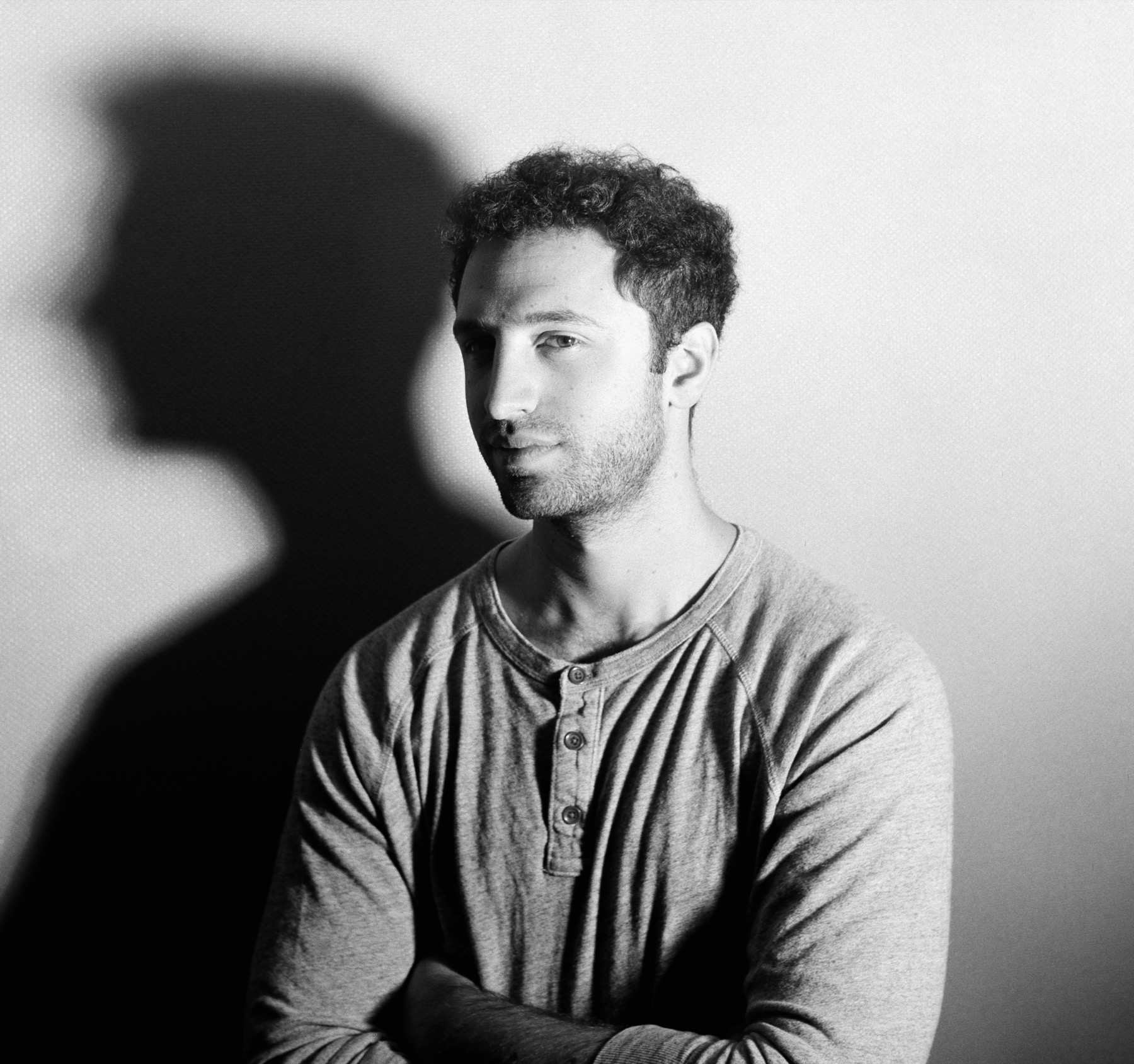 Black and white portrait of Joshua Weinfeld