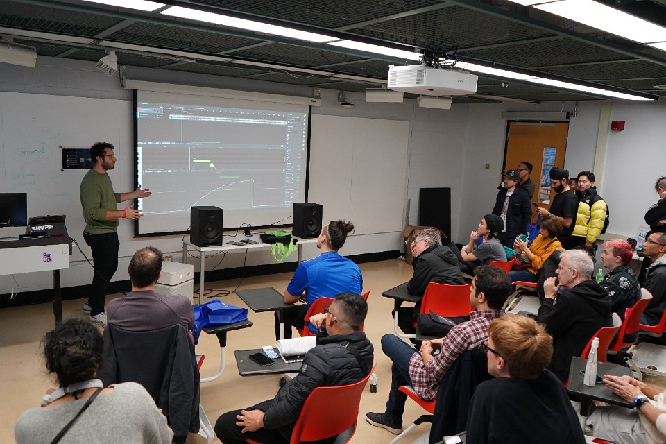Joshua Weinfeld leading a music software demonstration for an audience at IMSTA Toronto